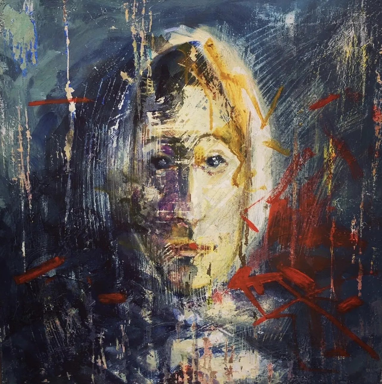 Face surfacing from a dark blue field scored with red marks