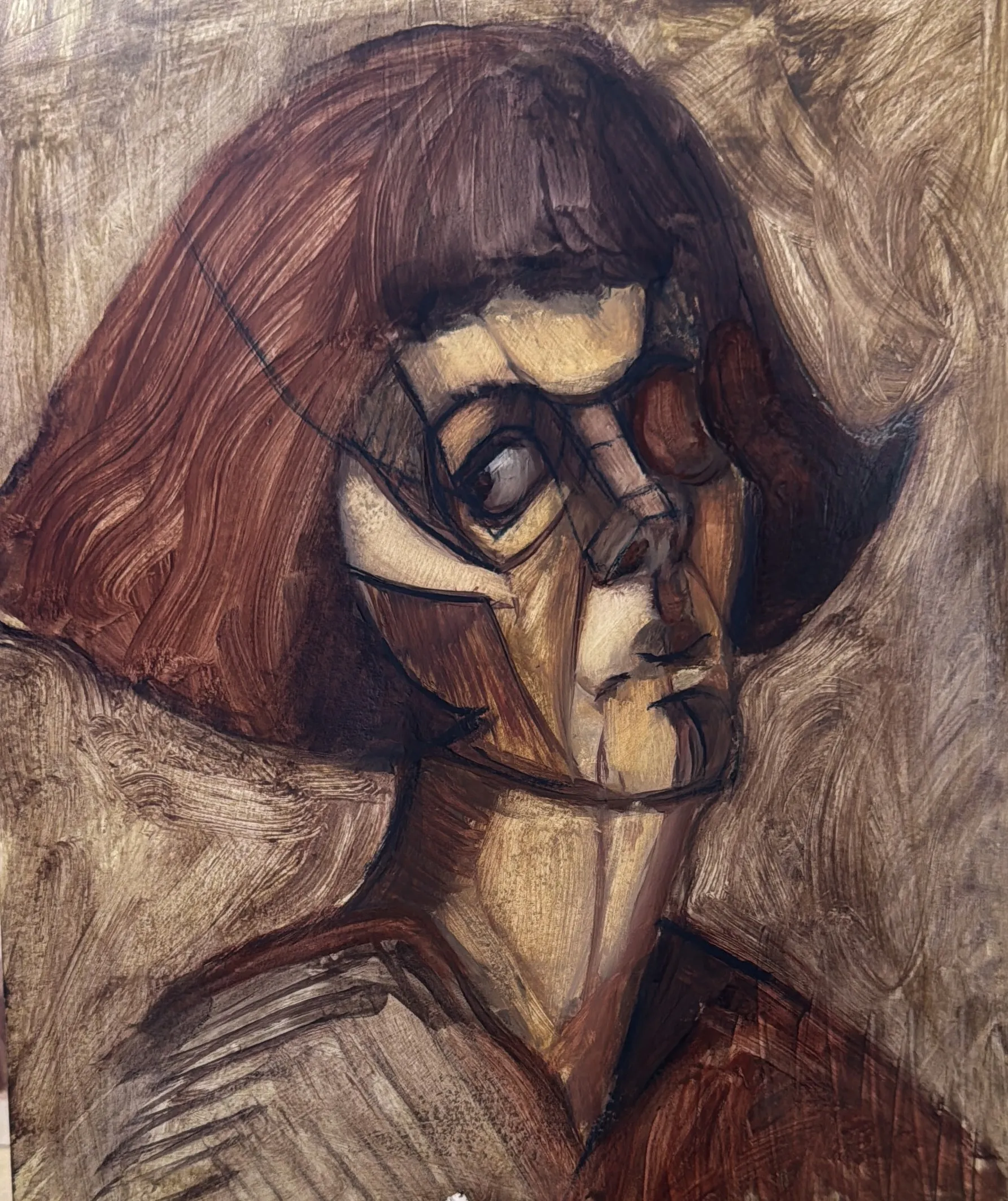 Face broken into angular ochre planes