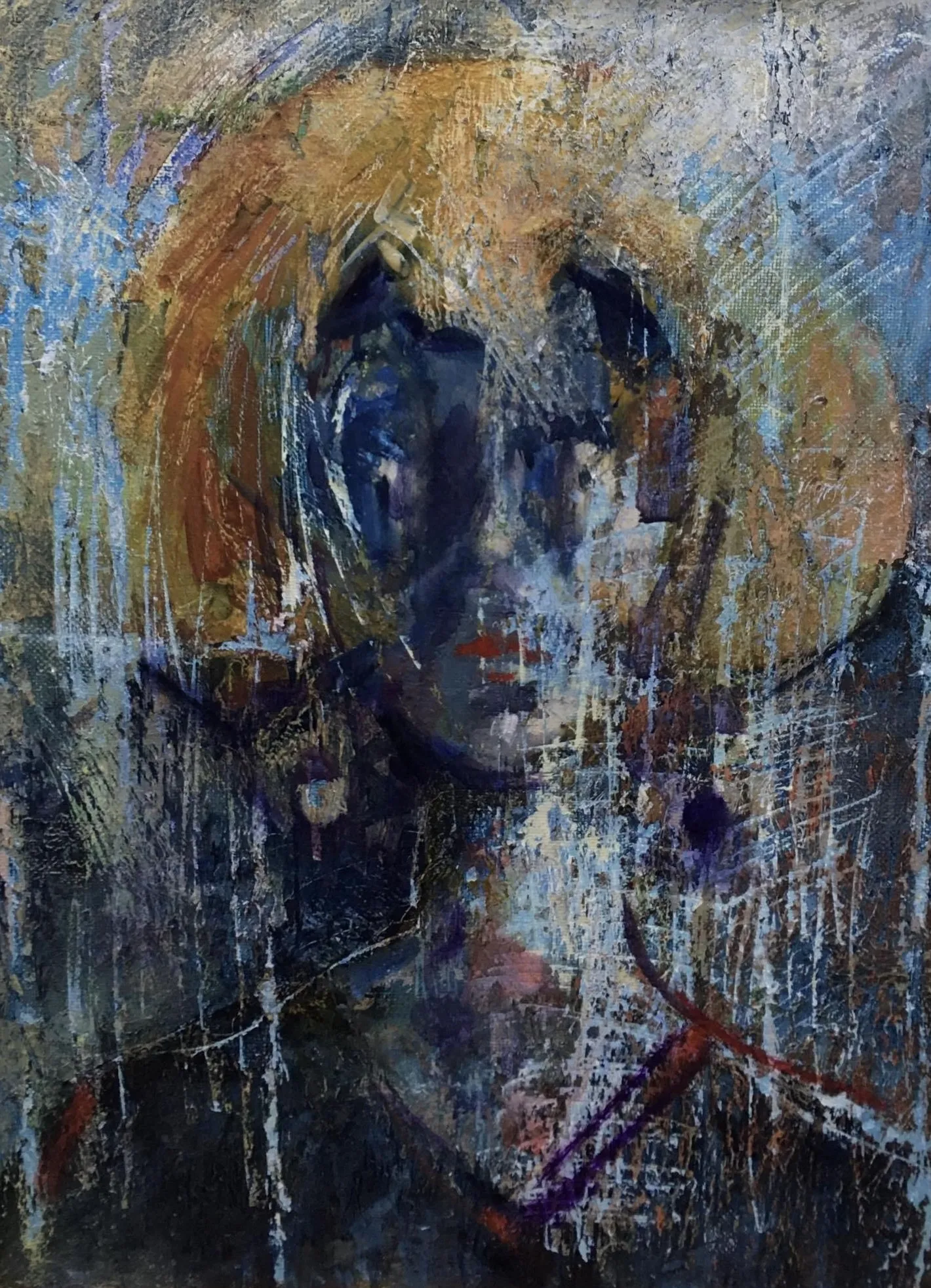 Blue face under a yellow halo of hair, a second face below