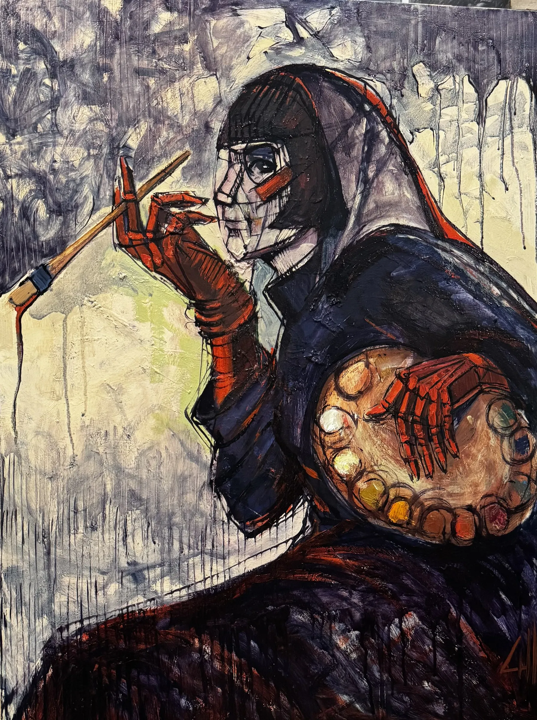 Hooded figure holding a palette and brushes